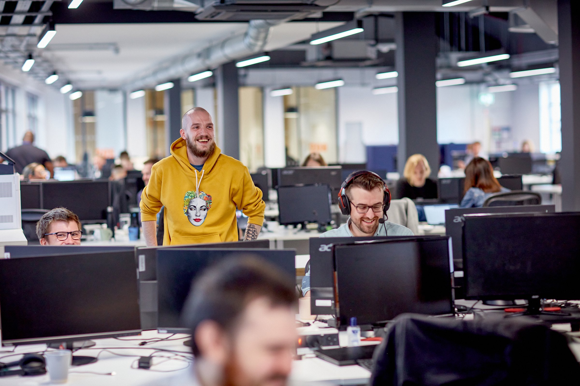 Image of the ENSEK team working in their office